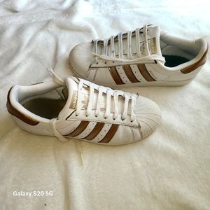 Adidas  superstar  shoes size 9 color gold and white